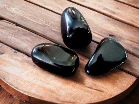 Svart obsidian tromlet stein 25-30 mm
